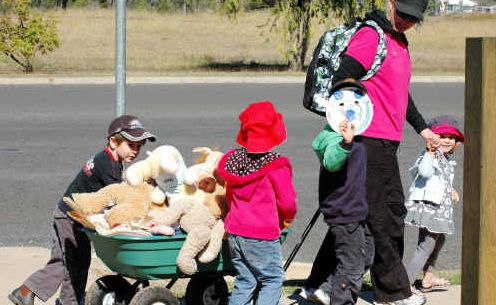 Kids cart along their cuddly best friends to the Teddy Bear’s Picnic. Kids cart along their cuddly best friends to the Teddy Bear’s Picnic.